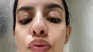 Woman was bathing and gets horny practicing exhibitionism