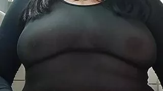 mature milf shows tits in black transparency below the hairy black