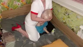 Dirty nurse sucks and wanks patient