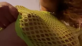 Neon fishnet no bra, tits popping out