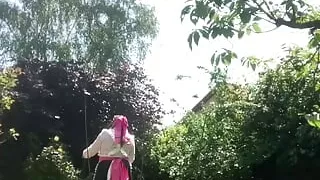 In a planter's outfit to mow the lawn