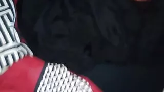 Edging over her shorts