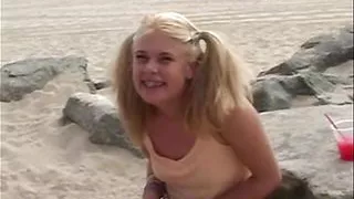 Little Summer fingering her pussy hard at the beach