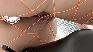 Pee with Plug in Fishnet Stockings