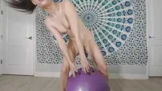 Solo brunette girl Georgia Jonest masturbating with  dildo on the ball in VR.