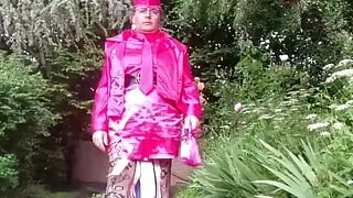 In fuchsia flight attendant outfit for an evening