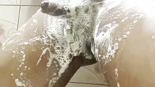 Indian hot boy big Massive Thick Dick  jerking and masturbating while bathing watching porn