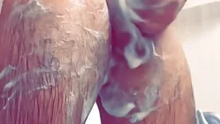 I play with my soft cock until it gets fully hard in the shower