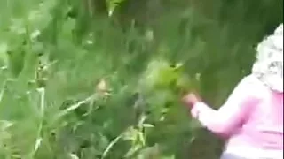 Widow working in the garden showing her