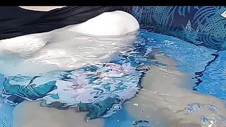 Rubbing my blue pedicured feet and toes all over her wet tits whilst chilling in the pool