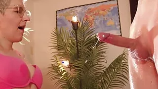 Hot MILF gives femdom handjob to her slave with awesome cumshot