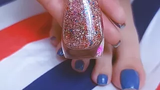 Teen with beautiful nails and legs is painting her nails while masturbate