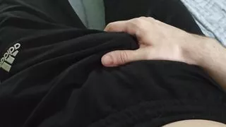 Guy in pants stroking himself and enjoying himself