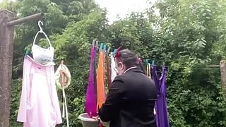 In an outfit with a red tight skirt to get my laundry