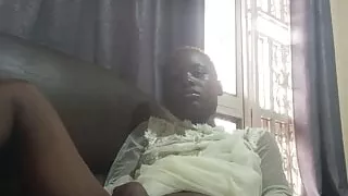 Fucking with carrot while sitted on sofa