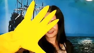 Yellow rubber gloves for fisting. Do you want to feel them in yourself? Dominatrix Nika and glove fetish.