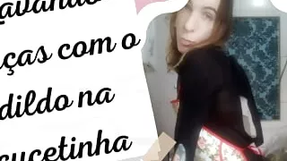 Washing dishes and playing with the dildo