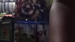 Sexy femboy crossdresser with black bra and thong playing