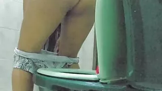 Camera records stepmother pissing in the bathroom