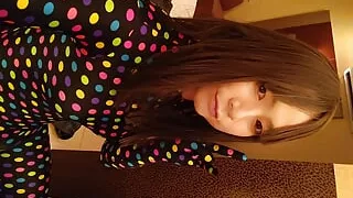Japanese crossdresses masturbate wearing colorful morphsuit