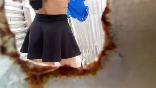 Camera in beach booth shows big ass and voluptuous Latina