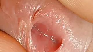 Alone at his friend's house, boy sounding the stick with homemade tool.