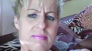 Horny milf masturbating than gets her tits creamed