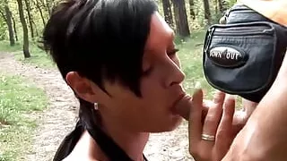 Busty brunette is satisfying her bf outdoors