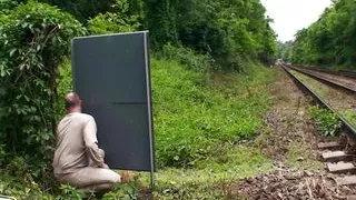 Cute brunette teen serving two cocks