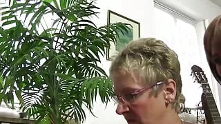 Lovely mature and her friends are pleasing two hard cocks