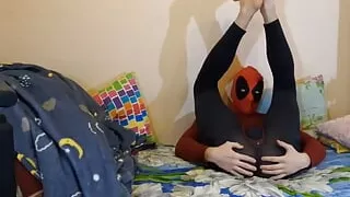 The friend's fetish made the straight boy put on the Deadpool costume.