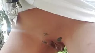 Splashing naked in the forest and going topless