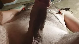 Handjob with nipple clamps