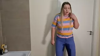 Locked in the bathroom with full bladder and pee in jeans