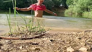 Slow motion jumping in lake in clothes. wet and fun