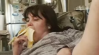 slut milf eats banana from her pussy