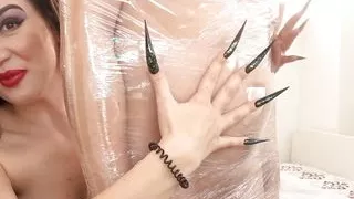 Kinkydomina Sits on a Mummified Slave