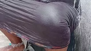 Tamil wife bathing in outdoor