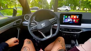 Blond babe gives handjob in a highly frequented parking lot next to the street - really risky