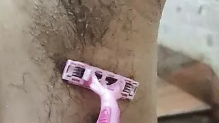 Hot Indian Bengali wife after long time cleaning her armpits and pussy and also her legs.