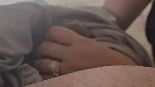 Step mom pulled out step son dick under blanket and handjob him