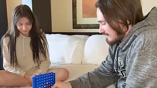 Playing a strip Connect 4 on the bed and losing all clothes in the process