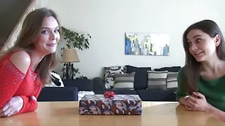 They are playing whatever game they find inside the mystery gift box