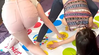 A sexy twister game with a big tits blonde and a skinny hot brunette