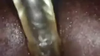 Horny bottom toying his big  black oiled ass