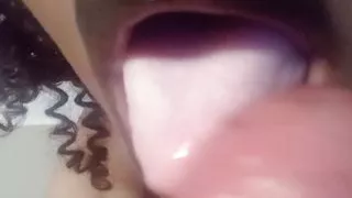 Young latina ruining black lipstick while sucking cock