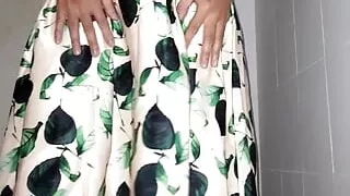 Urine and Sperm Flow Wetting the Satin Skirt of a Crossdresser