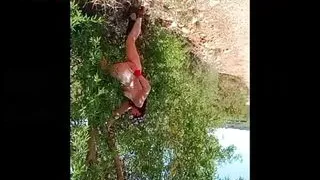 Walking naked in an orange field