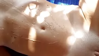 Huge cumshot on tan girl belly and tits