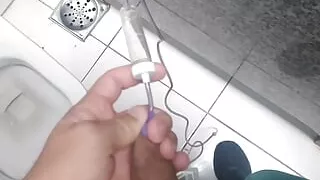 Making an application with serum directly into the boy's vein.